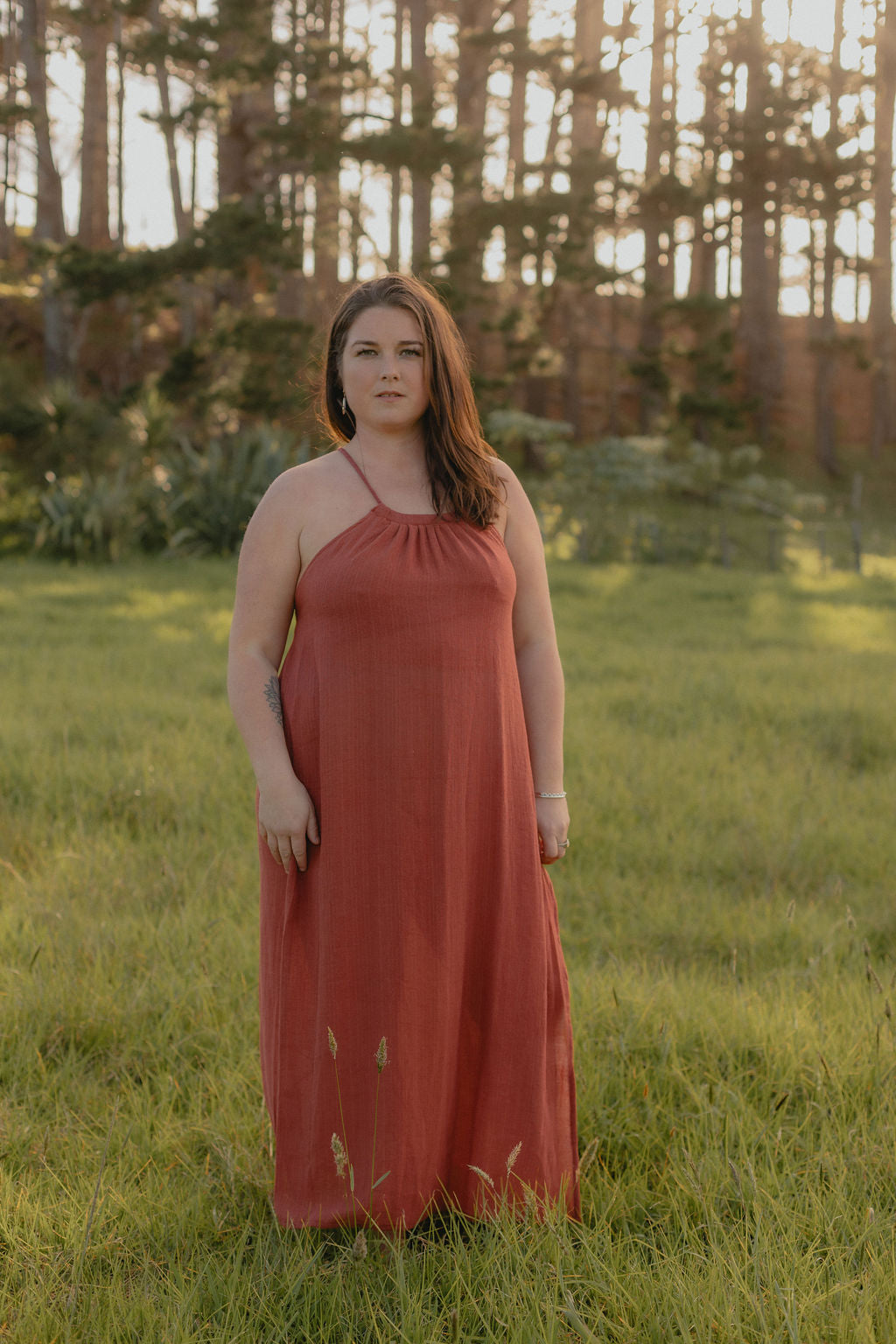 woman in burnt orange dress
