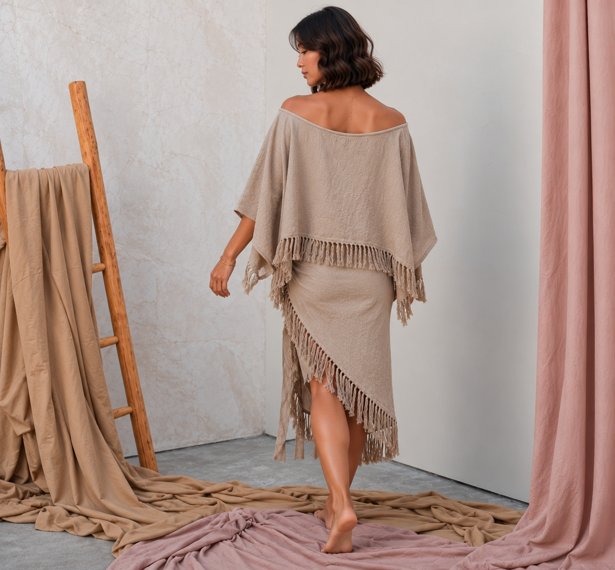 Asian model modelling tassel top and skirt